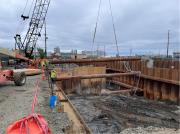 PLACING SHORING STRUT AT INTAKE PIPE COFFER DAM